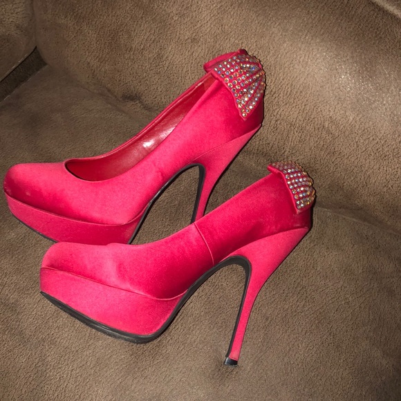 red heels with bow on back
